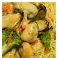 Capellini aux fruits de mer et petits légumes,[...]