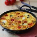 Tortilla aux tomates cerise ,olives noires et[...]
