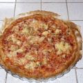 Pizza jambon, tomates, fromage et champignons.,[...]