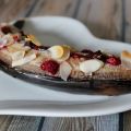 Bananes au four, amandes, framboises et chocolat