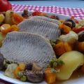 Rôti de porc aux légumes et pommes de terre