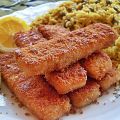 Poissons panés et curry de riz aux petits pois[...]