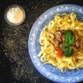 Noix de veau sauce tomatée & champignons