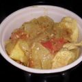 Cassolette de poulet au curry et ananas.,[...]