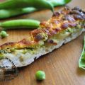 Pizza aux courgettes, aillet, petits pois,[...]