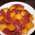 Salade de melon et magret séché au poivre