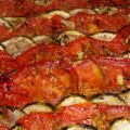 Tian de courgettes et tomates sur lit d'oignons[...]