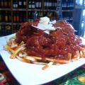 Osso buco d'agneau cuit en sauce bolognaise,[...]