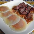 Rôti de magrets de canard farcis, ravioles de[...]