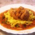 Cuissot de porc à la sauce tomates sur lit de[...]