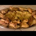 Le poulet à l'ail et coriandre avec des patates[...]