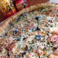 Quiche au jambon, aux champignons et aux olives